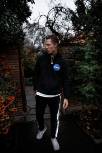 Streetwear Looks Built Around a Black NASA Bomber Jacket